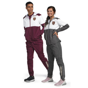 Male and female models in Holloway SeriesX Warm Up Pants and matching jacket, front view