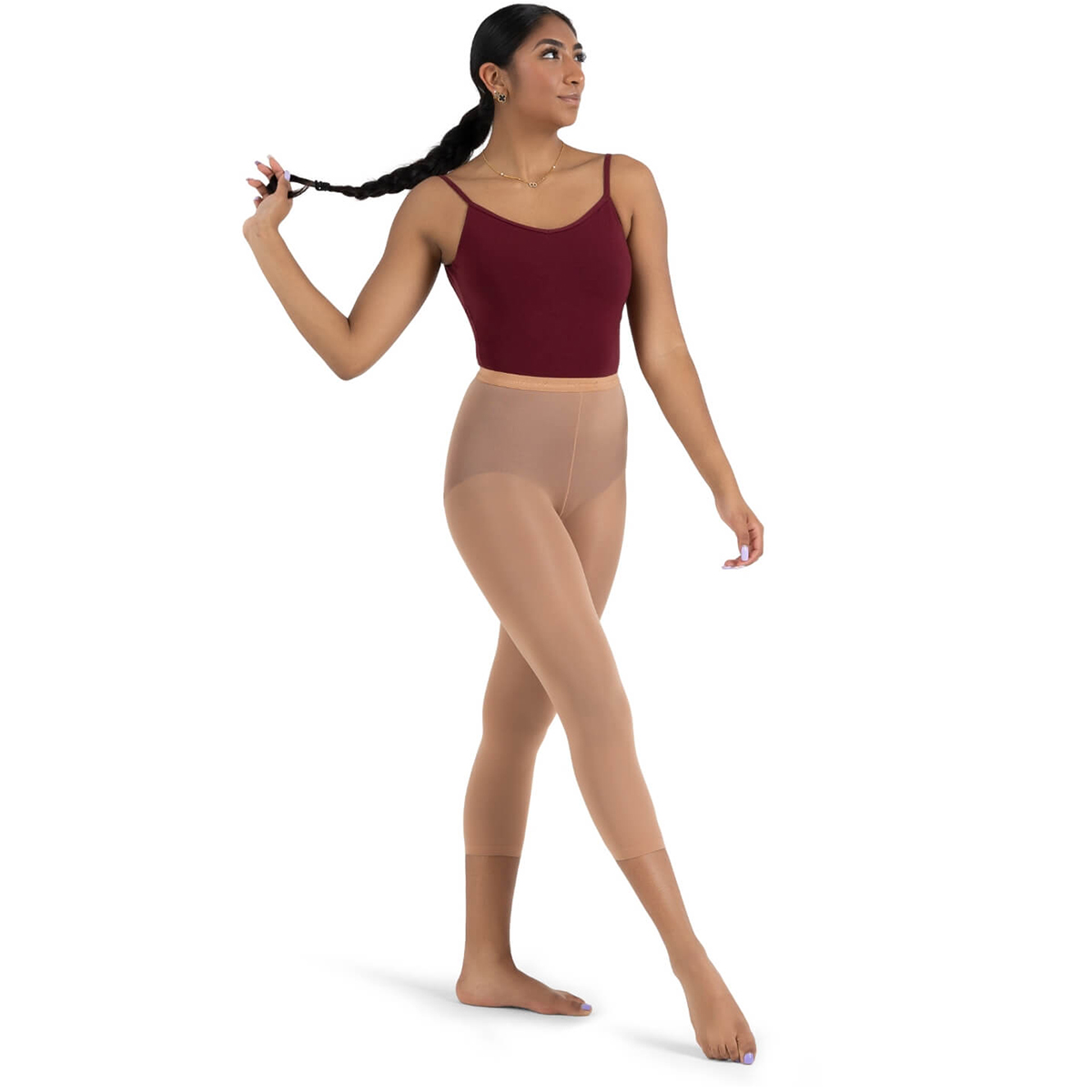 Model wearing Suntan Capezio Ultra Hold Footless Tights, Front Three-quarters View