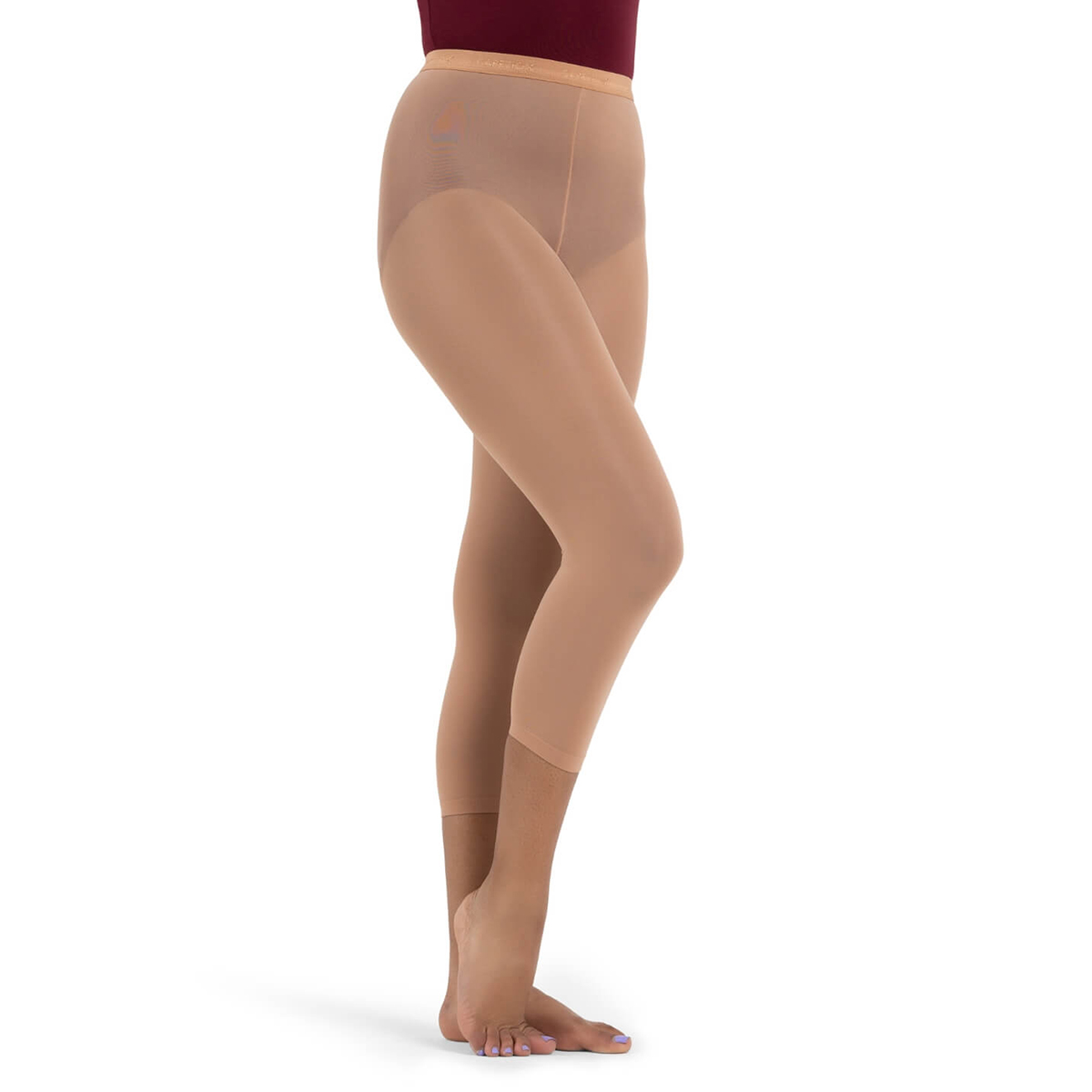 Model wearing Suntan Capezio Ultra Hold Footless Tights, Front Three-quarters View